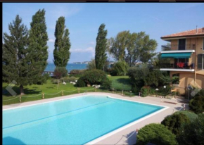 Гостиница Anai Apartment  Сирмионе